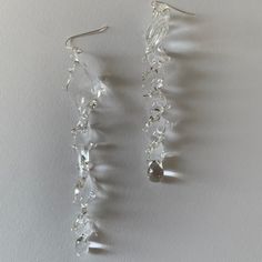 Welcome to Hidden Glass Atelier! Glad you have found me  ✦ DESIGN    ✧ Simple and elegant spiral dangling earrings with waves like deco, handmade with clear transparent Murano glass. The ear studs are made of sterling silver.    ✧ Styling: It is easy to wear up or down with a casual outfit or for a special occasion.  You could find a similar design ring set here :) https://hiddenglassatelier.etsy.com/listing/1554468897    ✧ Durability: All the glass jewelry pieces are tempered by a professional Boho Waves, Murano Glass Earrings, Murano Glass Jewelry, Unique Jewelry Designs, Dangling Earrings, Unusual Gifts, Glass Earrings, Ear Studs, Glass Jewelry