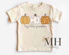 Hey There Pumpkin Shirt, Boho Fall Autumn T-shirt, Kids Pumpkin Patch Shirt, Thanksgiving, Girls Kids Toddler Halloween Natural Tee Kids Unisex T-Shirt/Long sleeve & Baby Bodysuit size 3-6M & above -4.2 oz., 100 % combed and ring spun cotton.  Light weight and soft. Baby body suits -Newborn & 0-3M is organic 100% cotton rib fabric & super soft.   Please note the main photo is a mockup of the design that will be printed. Picture will vary slightly due to lighting & or monitor settings.  CARE INST Hey There Pumpkin, Patch Shirt, Patches Shirt, Body Suits, Autumn T Shirts, Thanksgiving Kids, Rib Fabric, Toddler Halloween, Boho Fall