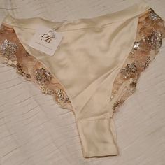 Honey Birdette Silk Shorts Whitney Ivory Medium New With Tag! (I Also Have The Ivory Pants In A Small Available) Elegant Beige Bottoms With Lace Trim, Cream Lace Trim Bottoms For Loungewear, Chic Beige Bottoms For Wedding, Feminine Cream Bottoms For Wedding, Feminine Beige Party Bottoms, Feminine Cream Wedding Bottoms, Elegant Cream Bottoms For Loungewear, Feminine Beige Bottoms For Loungewear, Feminine Beige Loungewear Bottoms