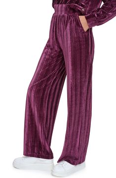 Perfect for a day or night out, these classy pull-on pants are constructed from luxuriously soft ribbed velour in a wide-leg silhouette. 30" inseam Elastic waist Front slant pockets 96% polyester, 4% spandex Machine wash, tumble dry Imported Multicolor Ankle-length Loungewear Pants, Versatile Pull-on Wide Leg Pants For Loungewear, Comfort Stretch Pull-on Loungewear Pants, Versatile Wide Leg Pull-on Lounge Pants, Multicolor Wide-leg Loungewear Bottoms, Steve Madden Sneakers, Flip Flop Slippers, Jogger Sweatpants, Sweaters And Leggings