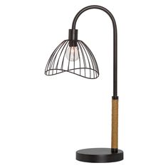 a lamp that is on top of a black stand with a light bulb in the middle