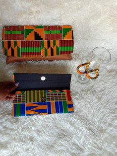 **African çlutch bags,African print bag,African leather purses, women purses.***They are made out of kente  and jute material***They are fabulous way to bring taste to any outfit.***Perfect christmas gift for her.**Comes with a matching wallet.and earrings.. ***Perfect gift for loved ones. ***For wholesale kindly message us.Ship via dhl express.Thank you for stopping by. Green Bag With Card Slots As Gift, Green Bags With Card Slots As Gift, Green Rectangular Clutch As Gift, Green Rectangular Clutch For Gift, Green Bags With Card Slots For Gifts, Rectangular Green Clutch For Gift, Green Rectangular Clutch Gift, Trendy Multicolor Wallets For Gifts, Trendy Green Clutch As Gift