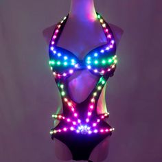 Light Up the Night in Style - LED Bodysuit ✨ Ready to steal the spotlight? We are please to introduce our new radiant must-have: this dazzling LED bodysuit! Whether you're on the dance floor, rocking a stage, or just want to glow like a neon star, this suit will light up your vibe. 🌟 Made with a sleek black base, this one-piece features eye-catching LED lights that shine bright in a rainbow of colors. It's perfect for those who love to stand out and turn heads, plus it's comfortable enough for Party Bodysuit, Light Party, Festival Lights, Dance Floor, Womens Bodysuit, Catsuit, Shine Bright, Sweden, Favorite Outfit