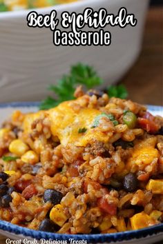 beef enchilada casserole in a blue and white bowl