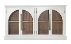 a white china cabinet with three arched doors and two shelves on each side, one door open