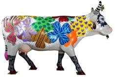 a cow is painted with many different colors and patterns on it's body,