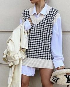 Channel yourself with the Houndstooth V-neck Knitted Vest Sweater! Comfy and stretchy knit shapes this essential sweater that has a V-neckline, sleeveless, and an oversized, boxy bodice. Unlined.100% AcrylicHand Wash Cold. Do Not Bleach. Hang To Dry. Size US AU/UK EU S 4-6 6-8 34-36 M 8-10 10-12 38-40 L 12 14 42 Trendy V-neck Sweater For Work, V-neck Sweater Vest For Fall, Casual V-neck Stretch Sweater Vest, Knitted V-neck Top For Work, White Stretch V-neck Sweater For Fall, Casual Knit V-neck Sweater For Work, Stretch Knit V-neck Vest, Stretch V-neck Vest For Fall, V-neck Knitted Workwear Tops