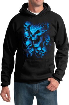 a man wearing a black hoodie with blue skulls on it