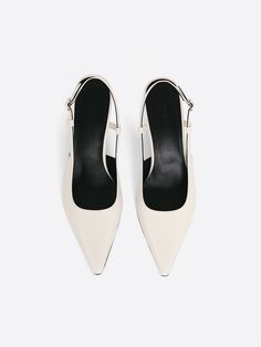 Editor's NotesRareness' shoes are designed for comfortable and elevated essential styles.- Slingback heeled pumps- Subtle glossy leather- Adjustable buckle strap- Kitten heel- Glossy leather texture- Slim pointed toe- Minimal and chicMeasurements(in.)- Size:: KR 225MM(US 5.5) ~ KR 260MM(US 9)- Heel height: 2.4  in* Fits true sizeComposition & Care- UPPER:  Cow Leather- LINING: Pigskin Leather- INSOLE: Kidskin Leather- Avoid direct heat and moisture- Professional cleaning is recomme Office Slingback Sandals With Heel Strap In Patent Leather, Office Slingback Pumps With 4-inch Heel And Square Toe, Patent Leather Slingback Sandals With Heel Strap For Office, Office Patent Leather Slingback Sandals With Heel Strap, Office-ready Patent Leather Slingback Sandals With Heel Strap, Patent Leather Slingback Pumps With Buckle, Business Slingback Pumps With Sculpted Heel And Ankle Strap, Business Slingback Pumps With Heel Strap, Sleek Slingback Pumps With Sculpted Heel And Ankle Strap