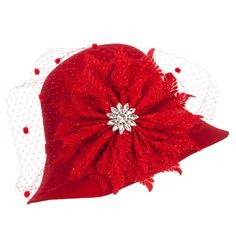 Flower Crystal Net Pom Wool ClocheMade of 100% wool.One size fits most women with an inner elastic adjustable tie, fitting up to 7 1/4.Fitted with an inner satin hatband.Adult/Woman.Crown measures 4 inches deep.Brim measures 3 - 3.5 inches long.Hand wash only.Imported. Fashionable wool felt cloche hat for ladies.Round and flexible crown.A big flower decoration with a small crystal flower inside is accented on one side.Decoration is detailed with a net and small poms.Slanted brim; side brim is sl Adjustable Costume Hats And Headpieces For Church, Brimmed Cloche Hat For Church In Winter, Winter Brimmed Cloche Hat For Church, Winter Church Brimmed Cloche Hat, Evening Felt Hat With Short Brim, Winter Mini Hats With Short Brim For Church, Winter Mini Hats For Church With Short Brim, Winter Church Mini Hats With Short Brim, Adjustable Red Felt Hat For Formal Occasions