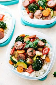 two plates with sausages, vegetables and rice on them