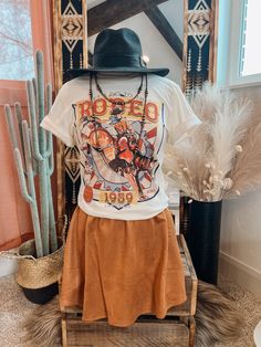 All things western. This tee is perfect for any rodeo during any season! Crew Neck | Short Sleeve | Unisex Fit Bella Canvas Material: 100% CottonSmall (2/4) | Medium (6/8) | Large (10/12) | XL (14/16) | 2XL (18/20) Country Style Tops For Fall Country Events, Western Tops For Rodeo In Fall, Western Style Tops For Rodeo In Fall, Western Crew Neck Tops For Country Events, Country Style Tops For Western-themed Spring Events, Casual Tops For Country Events In Fall, Cotton Tops For Fall Western-themed Events, Country Style Tops For Fall Rodeo, Country Style Crew Neck Top For Rodeo