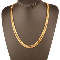 Transform any outfit with our luxurious chunky gold chain necklace. Made with high-quality materials, this necklace exudes elegance and sophistication. Elevate your style with this timeless piece and make a statement wherever you go. A must-have for any fashion-forward individual. Occasion : PartyCompatibility : All CompatiblePendant Size : No pendantShape\pattern : GeometricModel Number : NoneMaterial : MetalChain Type : Link ChainStyle : PunkNecklace Type : Chains NecklacesGender : MenMetals T