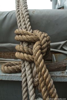 the rope is attached to the boat's hull