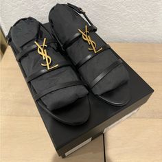 Authentic Ysl Sandals Black And Gold Closed Back Worn Only Once Size 40 Pet Free And Smoke Free Home Willing To Negotiate Ysl Cassandra Sandal, Black Ysl Wedges, Opyum Ysl Shoes, Yves Saint Laurent Black Dress, Saint Laurent Black Heels, Ysl Sandals, Yves Saint Laurent Shoes, Black Sandals, Yves Saint Laurent