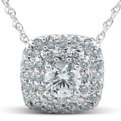 This womens high quality pendant features a 3/4ct center round cut diamond and 33 round cut accent diamonds. All diamonds are prong set in solid 14k white gold high polished mounting. An 18" chain is included. Color: gold/white. Gender: female. Age Group: adult. Diamond Necklace With Halo Setting, Anniversary Lab Grown Diamond Necklace With Halo Setting, Dazzling Diamond Necklace With Round Cut Accents, White Diamond Necklace With Halo Setting For Anniversary, White Gold Diamond Necklace With Cubic Zirconia Accents, Round Cut Diamond Necklace With Diamond Accents, Anniversary Lab Grown Diamond White Diamond Necklace, Dazzling Lab Grown Diamond Necklace With Accents, Moissanite Diamond Necklace With Round Cut