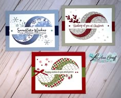 three christmas cards with different designs on them