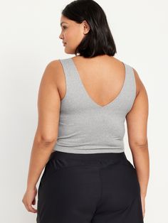 v-neck wide straps go-dry wicks moisture breathable fitted hits at natural waist provides light support for a-c cups models are approx.  5'9" and wear sizes s (4), l (12), and xl (18)machine wash according to the care instruction label Seamless Athleisure Tops With Wide Straps, Athleisure Tops With Seamless Wide Straps, Athleisure Seamless Tops With Wide Straps, Sleeveless Athleisure Tops With Medium Bust Support, Workout Tops With Medium Bust Support And Wide Straps, Sports Tops With Seamless Wide Straps, Sporty Seamless Tops For Relaxation, Casual Activewear With Bra-friendly Wide Straps, Athleisure Tops With Medium Bust Support And Wide Straps