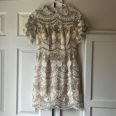 Nwt Blue Door Boutique Embroidered Dress - Size Small. It Has A Sheer Neckline With Beautiful Embroidery! I Bought This For My Rehearsal Dinner, But Unfortunately It Didn’t Work. It’s Perfect For A Summer Or Spring Bride! Beige Lace Dress With Floral Embroidery, Beige Embroidered Lace Dress, Short Sleeve Lace Embroidered Party Dress, Short Sleeve Lace Dress With Intricate Embroidery, Short Sleeve Lace Embroidered Dress For Wedding, Short Sleeve Lace Embroidered Wedding Dress, Elegant Beige Mini Dress With Floral Embroidery, Cream Lace Dress With Intricate Embroidery, Cream Lace Dresses With Intricate Embroidery