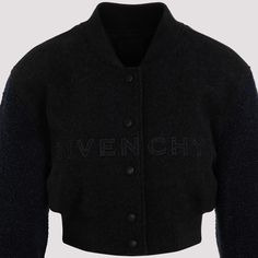 Givenchy Charcoal Dark Grey Wool Jacket. Crafted in wool and polyamide blend. Stand-up collar, v-neck, front buttoned fastening, front tonal lettering logo, long sleeves, ribbed cuffs and hem, straight hem, cropped design. Long Sleeve Varsity Jacket With Logo Detail For Winter, Classic Fall Outerwear With Logo Detail, Classic Fall Outerwear With Logo, Black Varsity Jacket With Embroidered Logo For Winter, Classic Winter Outerwear With Logo Detail, Classic Winter Outerwear With Logo, Winter Varsity Jacket With Padded Collar, Winter Varsity Jacket With Padded Collar And Long Sleeves, Wool Outerwear With Embroidered Logo And Long Sleeves