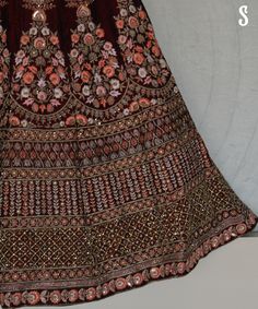 Design is thinking made visual. Burgundy velvet lehenga with intricate aari, resham and zardosi details. Bohemian Rug, Design