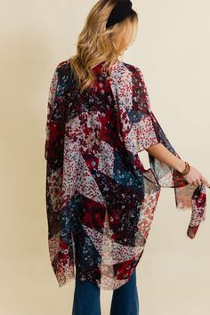 Add a touch of boho chic to your wardrobe with our Floral Fantasy Kimono. This stylish and comfy piece features a beautiful floral pattern that will elevate any outfit. Perfect for a cute and trendy look, whether you're hitting the beach or strolling through the city. #lovemyleto 100% Polyester Imported Casual Patterned Kimono For Beach Cover-up, Multicolor Print Kimono For Spring Beach Cover-up, Summer Kimono With Abstract Print, Fall Boho Print One-size Kimono, Fall Beach Kimono With Boho Print, Fall Floral Print Hippie Kimono, Fall Hippie Floral Print Kimono, Fall Beach Boho Print Kimono, Multicolor Floral Print Kimono One Size