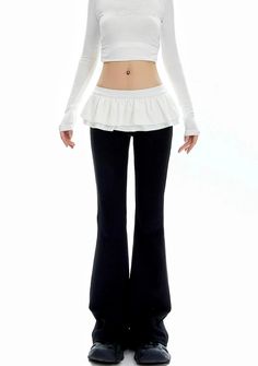 Discover the essence of effortless style with our Bell Bottom Ruffle Waistband Skirt-Pants, where comfort meets chic. 

Made with a blend of premium fabrics, these skirt-pants feature a unique ruffle waistband that adds a touch of whimsy to your ensemble. The thoughtful design boasts bell-bottom flares for a leg-elongating effect and a refreshingly light fabric that makes summer heat bearable. Its airy silhouette and black color ensure it pairs perfectly with tops of any style for a look that's Skirt With Pants, Grunge Accessories, Ballet Style, Ballet Fashion, Sweatshirt Set, Bell Bottom, Sweatshirt Dress, Fold Over, Flare Pants