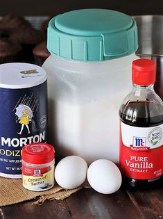 ingredients to make an ice cream cake sitting on a table