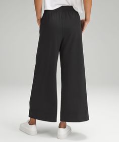 These high-rise, wide-leg crops flow with your every move for an easy approach to your daily routine. Designed for Casual. Relaxed fit is roomy through glutes and thighs:Sits away from body, hip to hem:Intended to sit above ankle. Hand pockets with hidden card sleeve. Black Relaxed Fit Wide Leg Ankle-length Pants, Black Stretch Wide Leg Mid-rise Pants, Black Ankle-length Wide Leg Pants With Pockets, Black Non-stretch Cotton Wide Leg Pants, Black Wide Leg Pull-on Bottoms, Cropped Pants Women, Wide Leg Cropped Pants, Womens Capris, Card Sleeve