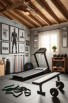 there is a treadmill in the room with pictures on the wall and other equipment