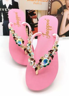 Description The beautiful rhinestone and customizable Flip Flops for the beach brides, bridesmaids, vacation, honeymoon or any occasion you desire to look gorgeous. Perfect in any outfit! Being unique and stunning on design, these flip flops must be your must-have item! The sandal is anti-slip, comfortable and durable as it is made from high quality rubber from the South of Thailand, where is famous for the best rubber tree. Moreover, the crystals are decorated on the sandal with effective adhes Summer Prom Sandals With Rhinestones, Rhinestone Sandals For Prom In Summer, Wedding Toe Post Sandals With Rhinestones, Glamorous Pink Beach Sandals, Glamorous Pink Sandals For Beach, Elegant Rhinestone Flip Flops For Party, Elegant Party Flip Flops With Rhinestones, Elegant Rhinestone Flip Flops For Summer, Summer Rhinestone Toe Post Flip Flops