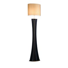 a black lamp with a beige shade on it's side and a white background