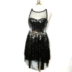 Black Mini Dress With Contrast Sequin For Prom, Black Sequin Dress With Contrast For Party Season, Black Contrast Sequin Dress For Party Season, Metallic Sleeveless Sequin Party Dress, Metallic Sleeveless Sequin Dress For Party, Sleeveless Sequin Dress For Costume Party, Glamorous Black Glitter Evening Dress, Silver Sleeveless Sequin Party Dress, Metallic Sleeveless Party Dress