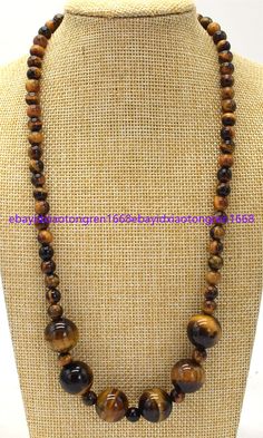 Store Categories Store Categories Other 6mm&14mm Natural Yellow Tiger's Eye Round Gemstone Beads Necklace 16-28 Inch Product Description Item Description: Size : 6mm&14mm Quantity:  1 Pcs Length: 16-28" Condition: New If you want to buy more , please contact us . Thanks ! &&&&: Sale the items does not include box.   Payment We accept only PayPal payment. A non-payment dispute will be opened if full payment is not received after 14 days of auction. Delivery details Item will be shipped within one working day after full payment is received. You should receive item within 25-30 days. Normally delivery time is about 25-30 working days. To get the shipping invoice, Just simply wait until all of the auctions have ended, and complete the checkout from the most recent Email or any auction page aft Brown Gemstone Beads Round Cabochons, Brown Gemstone Beads And Cabochons, Brown Gemstone Beads Cabochons, Brown Jewelry With 8mm Round Beads, Brown Crystal Necklaces With Natural Stones And Round Beads, Brown Jewelry With 8mm Oval Beads, Brown Crystal Necklaces With Round Natural Stones, Brown Crystal Necklaces With Natural Round Beads, Brown Crystal Necklaces With Natural Stones