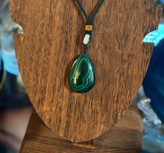 Beautiful large teardrop Malachite necklace. Polished stone with beautiful greens all through out. Malachite is a very powerful stone, great for protecting in the spiritual world, as well as manifestation energy. Teardrop Gemstone Necklaces For Healing, Teardrop Natural Stones Healing Necklaces, Teardrop Natural Stones Healing Necklace, Teardrop Natural Stone Healing Necklace, Spiritual Teardrop Pendant Necklaces With Natural Stones, Handmade Spiritual Teardrop Drop Necklace, Spiritual Teardrop Jewelry For Healing, Spiritual Healing Teardrop Jewelry, Spiritual Gemstone Teardrop Pendant Crystal Necklaces