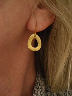 This item is made to order please allow 5 to 8 business days for your order to ship. These earrings are hand carved out of wax and cast in .925 sterling silver followed by a hand texturing and a heavy 14k gold plating. The ear wires are 14k gold filled with an additional layer of 14k gold to match the gold color of the dangle. They measure 16mm in length and 14mm in width, measured without the ear wires. Casual Earrings, Silver Gold Jewelry, Weird Shapes, Lovely Earrings, Everyday Earrings, Brass Jewelry, Simple Earrings, Circle Earrings, Gold Gold