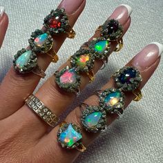 Price Is For One. New Genuine, Natural, High Grade Ethiopian Opals In Pyrite Sand. Fits Size 7 Best But Are Adjustable. Gold And Silver Available. The Opals Range From White Fire, Black Fire, Ovals, Nuggets, Tear Drop And Triangle Shape. Please Message Me After You Order To Let Me Know If You Prefer A Certain Ring Style. Otherwise The Ring Will Be Chosen At Random. Unique Hippie Rings, Spirtual Rings, Fire Opal Ring Opal Auctions, Glowing Crystal Ring, Antique Jewelry Opal, Fire Opal Engagement Ring Opal Auctions, Crystal Hippie Wedding Ring, Witchy Rings Jewelry, Bohieman Rings