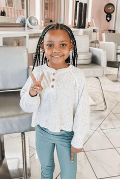 This nice hairstyle has cornrows that are parted nicely and start at the front of the head, going all the way back. It gives a traditional and cute look that is just right for little kids. The braids are all the same thickness and are pulled close to the scalp, showing a neat and low-maintenance style that can last for weeks. To finish this adorable look, - Click to see more of 20 Cute Cornrow Styles for Children and follow us for more hairstyle ideas. // Photo Credit: Instagram @_carmenwatkins