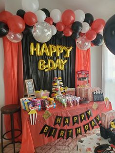 a birthday party with balloons and decorations