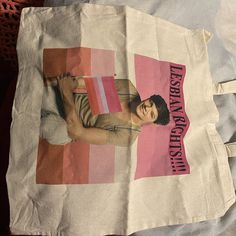 a tote bag with an image of a man on it