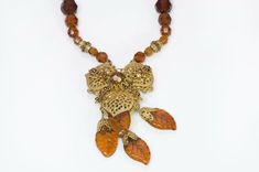 Miriam Haskell 1950’s Brown Glass Leaf Flower Necklace Vintage Amber Glass Necklaces, Vintage Brown Jewelry For Evening, Vintage Brown Necklace For Formal Occasions, Vintage Brown Jewelry For Gift, Vintage Glass Necklaces For Formal Occasions, Elegant Brown Glass Necklace, Miriam Haskell Jewelry, Beads Flower, Leaf Flower