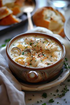 Creamy seafood chowder topped with herbs in a rustic bowl, with bread in the background. Oyster Chowder, Bisque Recipes, Oyster Stew Recipes, Canned Oysters, Rich Beef Stew, Oyster Soup, Seafood Stew Recipes, Oyster Stew, Cooked Oysters