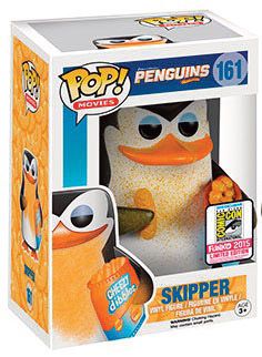 the penguin pop vinyl figure is in a box with an orange beak and black eyes