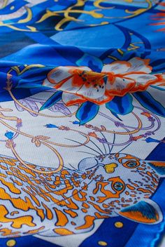 Wrap yourself in elegance and wildlife charm with an exquisite blue silk scarf featuring a characterful ocelot illustration. Designed to elevate your style, this scarf is a perfect blend of sophistication and nature-inspired art. #BlueSilk #Ocelot #Wildlife #Fashion #SamWilde Blue Silk Scarf, Art Patterns, Square Silk Scarf, British Artist, Blue Silk, Animal Illustration, Pattern Art, Nature Inspired, Bold Colors