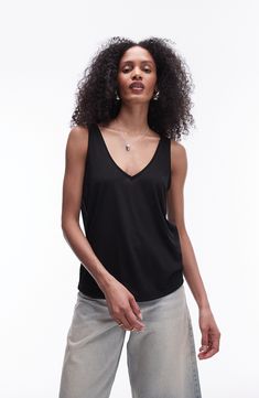 Made from lightweight jersey, this V-neck tank has a slouchy fit that's great for layering or letting the breeze in on hot days. V-neck 50% viscose, 50% polyester Machine wash, line dry Imported Chic Viscose V-neck Tank Top, Versatile V-neck Tank Top For Everyday, Chic V-neck Viscose Tank Top, Casual Viscose V-neck Top For Summer, Casual V-neck Top In Viscose For Summer, Everyday V-neck Tank Top, Chic Summer V-neck Top For Everyday, Seamless V-neck Camisole For Layering, Casual Stretch Viscose Tank Top