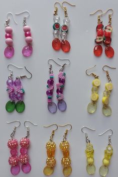 9 different styles of Dangly Earrings that are all handmade by me. Perfect for colorful outfits to complete your look! Cute Dangling Earrings, Safety Pin Jewelry, Colorful Outfits, Earring Making, Earring Ideas, Handmade Wire Jewelry, Earring Crafts, Themed Jewelry, Bracelets Handmade Beaded