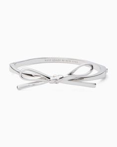 Skinny Mini Bow Bangle | Kate Spade Surprise Kate Spade Bow Bracelet, Bracelets To Make, Silver Bracelet Stack, Dream Bracelet, Kate Spade Outlet, Mini Bow, Birthday Bracelet, Reset Button, Bow Bracelet