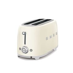 a white toaster sitting on top of a table