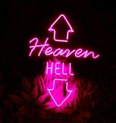 a neon sign that says heaven hell with an arrow pointing up at it's center