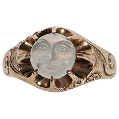 Rare Original Condition Victorian Man in the Moon Ring from the 19th Century in 14K gold. Original moonstone carved smiley face set high into pronged settings which give the appearance of sunburst with scrolls of clouds, hand engraved on shoulders of ring. Rare survival as rings of this sort were damaged if the wearer was wasnt careful as the moonstone cameo is mounted high. The adularescence (blue moon glow effect) comes from the upper left diagonally across the carving. Charming original Victo Victorian Wedding Band, Ring Styling, Moon Carving, Victorian Man, Man In The Moon, Hermes Kelly Bag, In The Moon, Glow Effect, Moon Ring